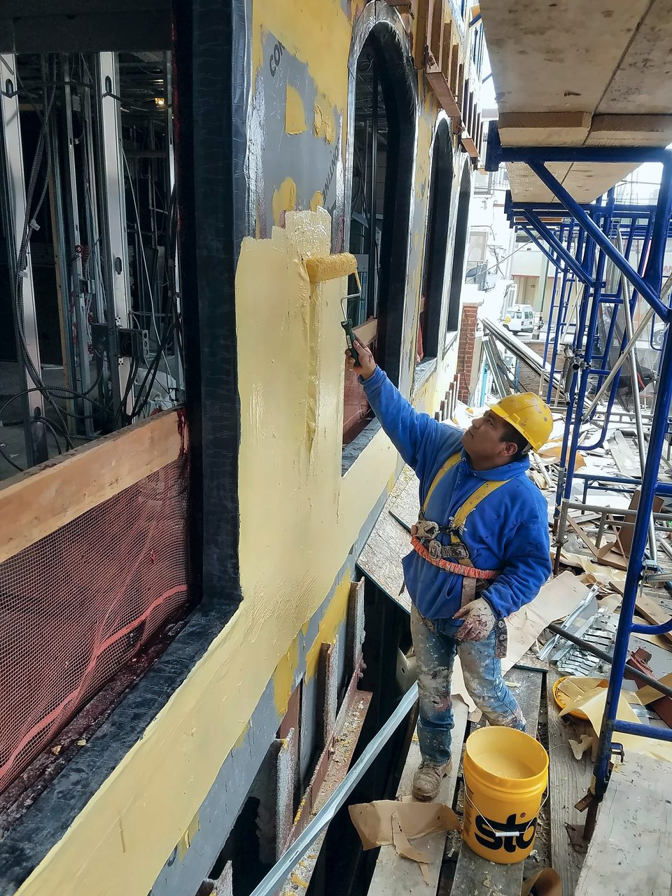 Liquid flashing applied at a window opening