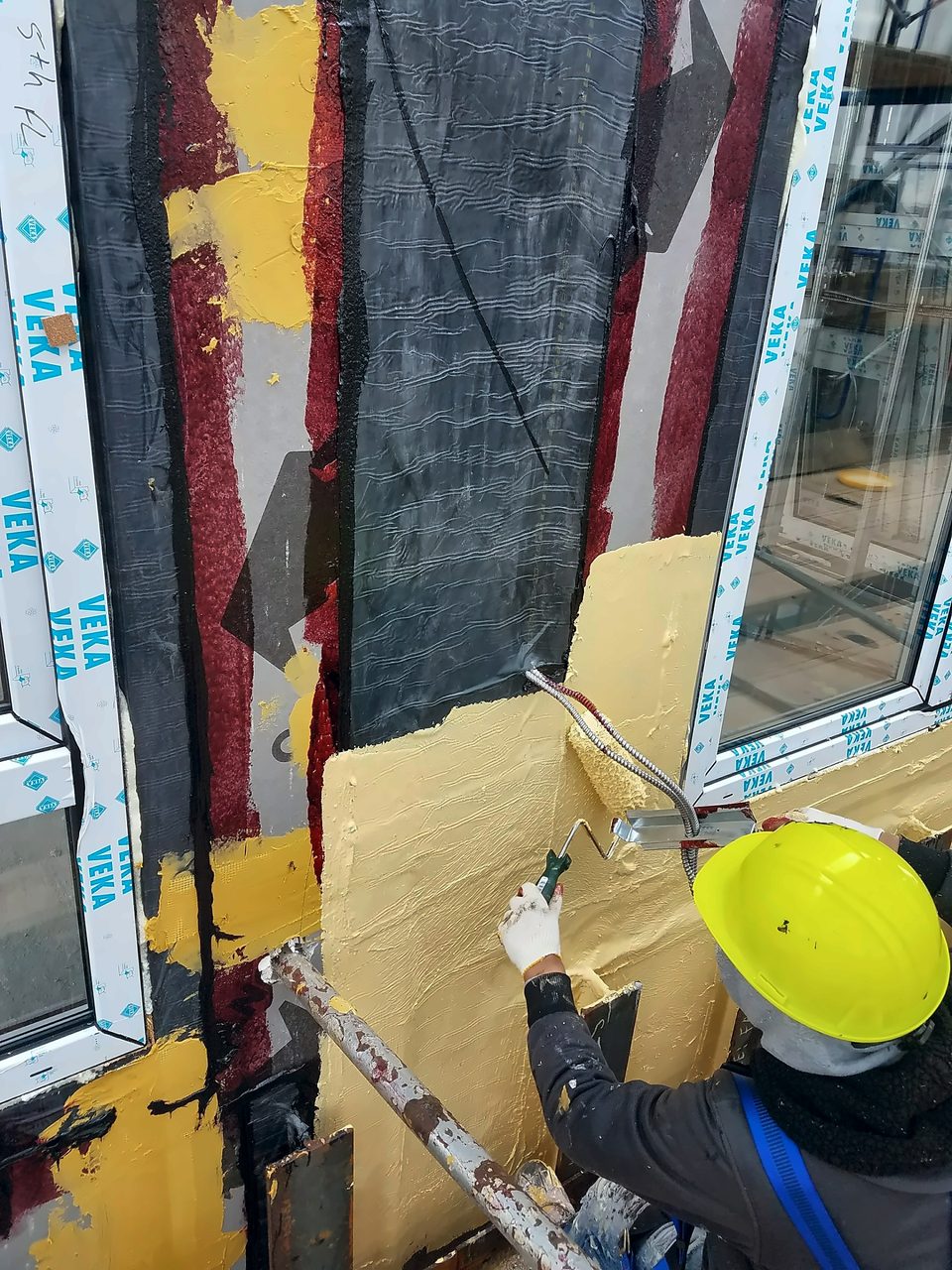 Sealant and liquid flashing at a window perimeter
