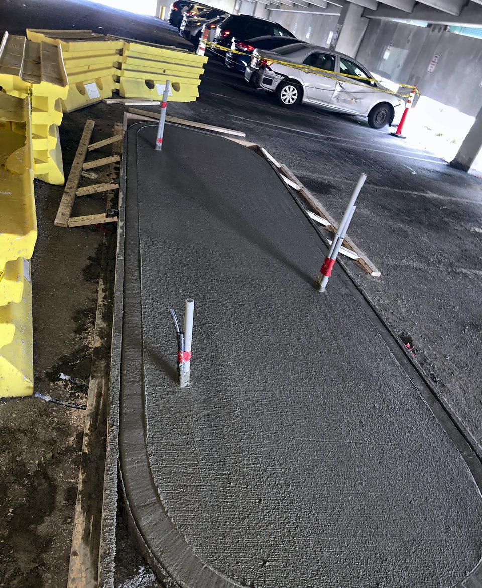 During: island placed by trailer pump and finished