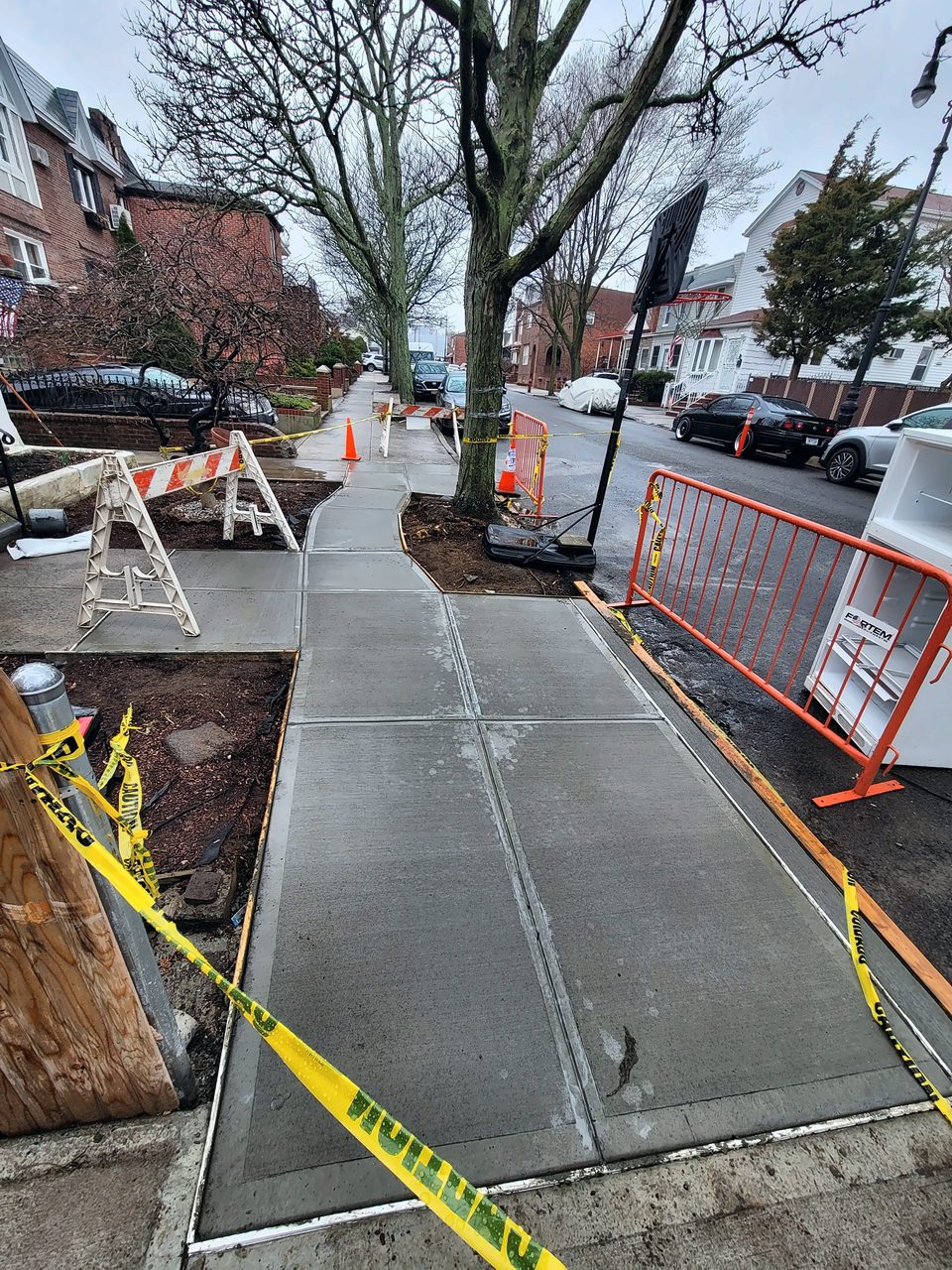 New sidewalk pour on a city street, 2022
