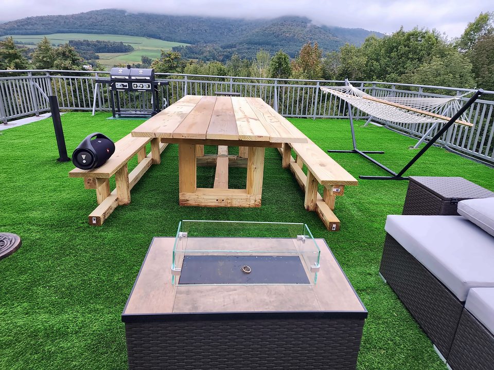 Backyard living space — deck, turf and fire pit, 2023