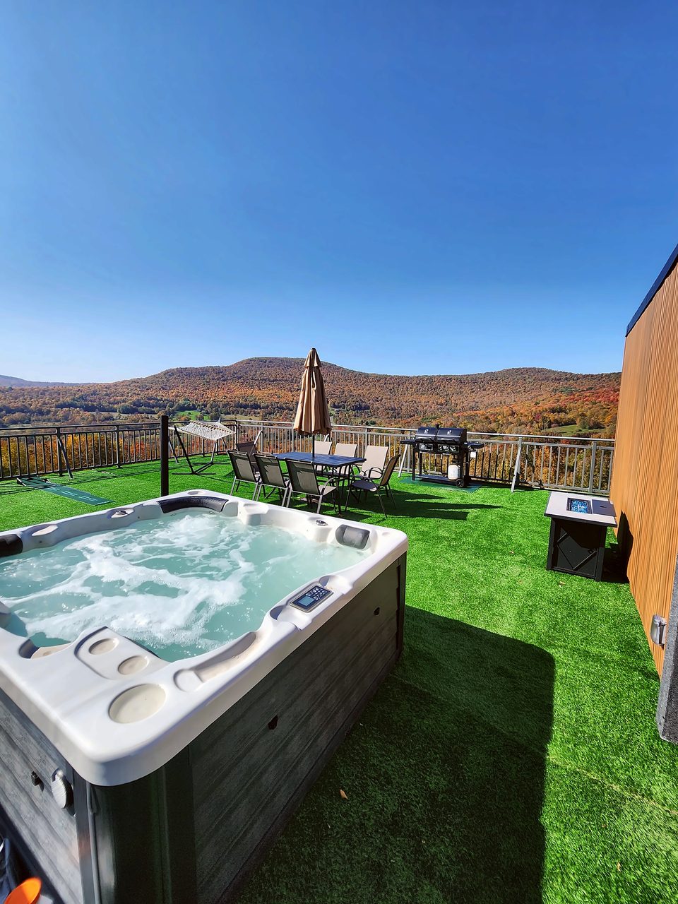 Rooftop hot tub on turf