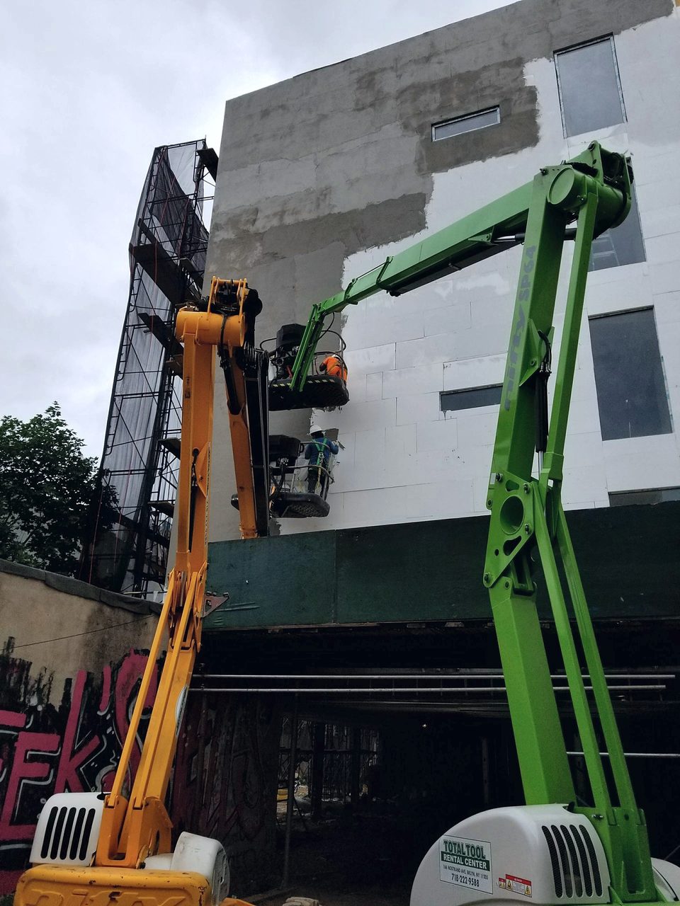 Boom lift at an EIFS elevation