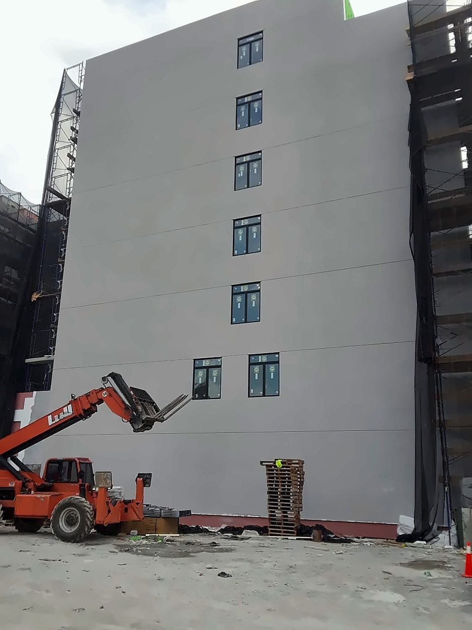 Finished white EIFS elevation