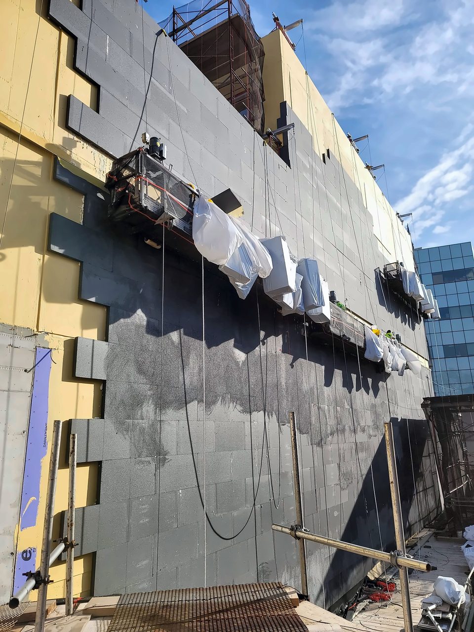During: basecoat and mesh from a suspended stage