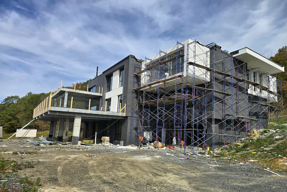 EIFS, stucco & exterior insulation — self-performed by The Dom Construction Group