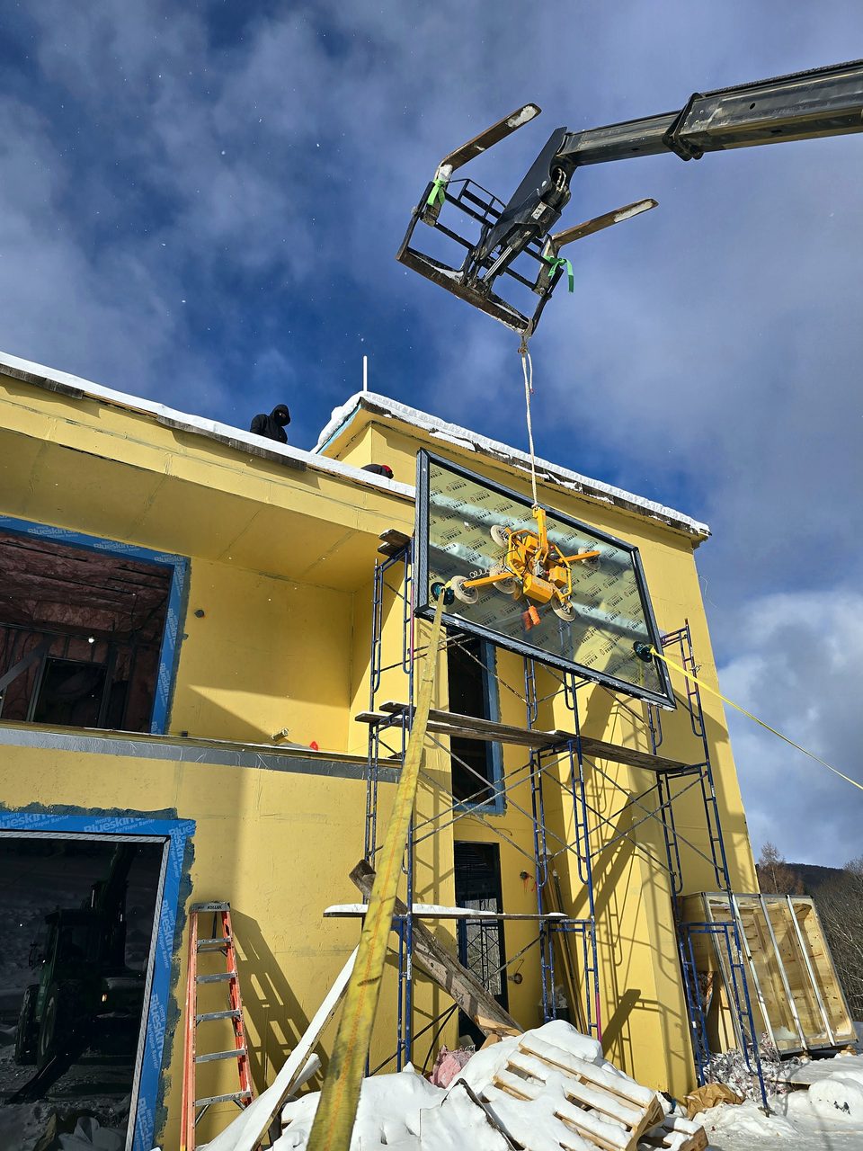 Crane lift at a facade restoration, 2024