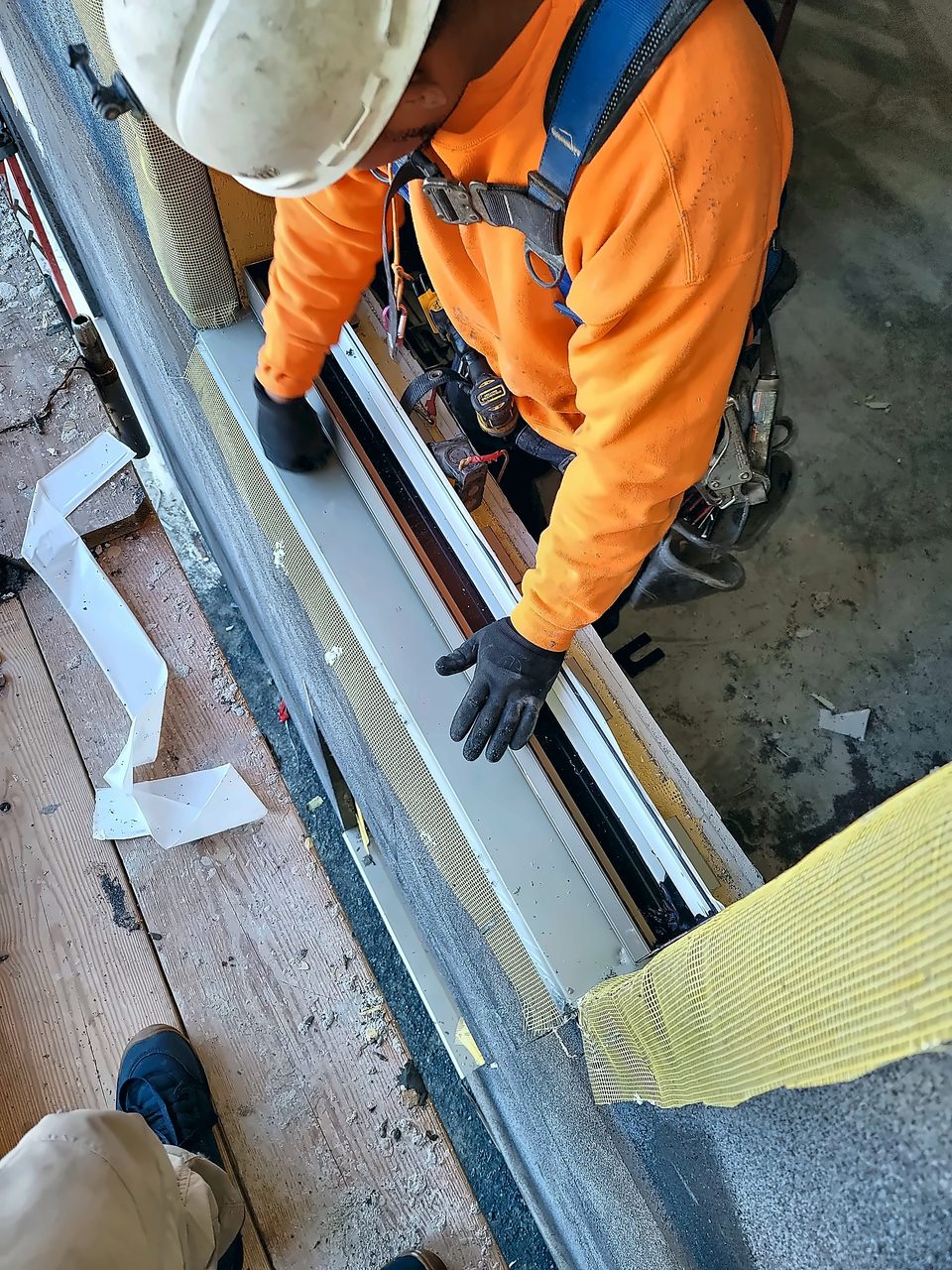 Window flashing being fitted, 2022