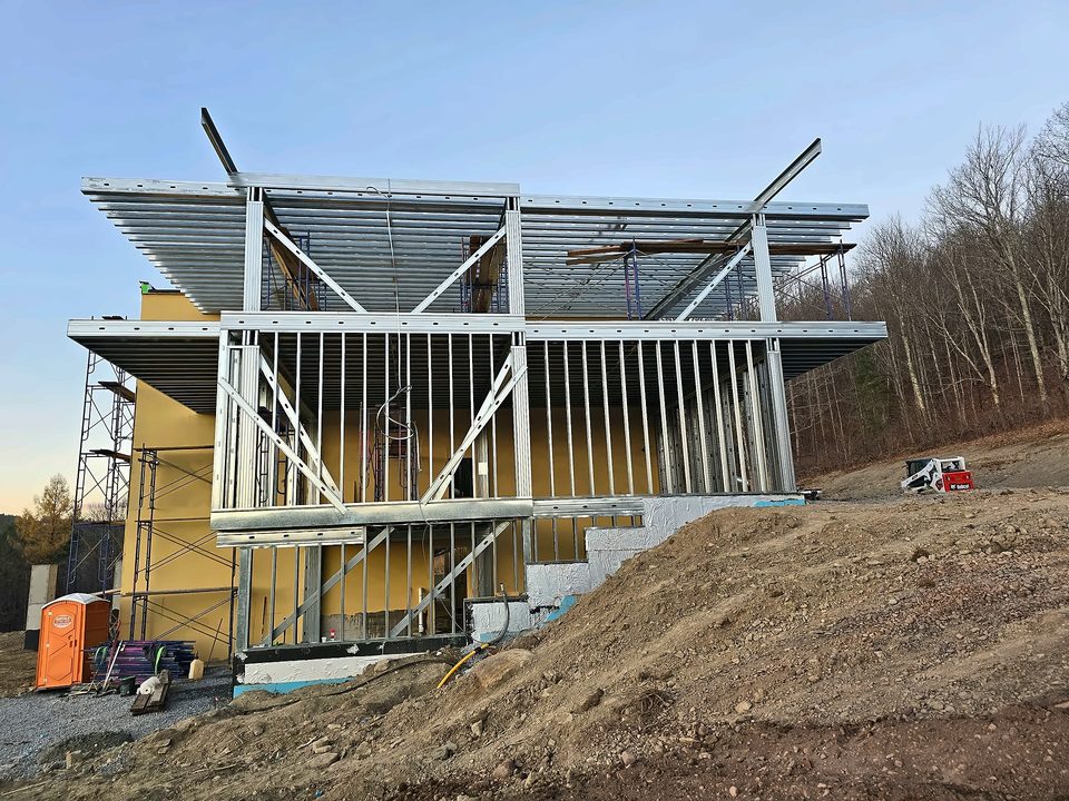 Steel & wood framing — self-performed by The Dom Construction Group