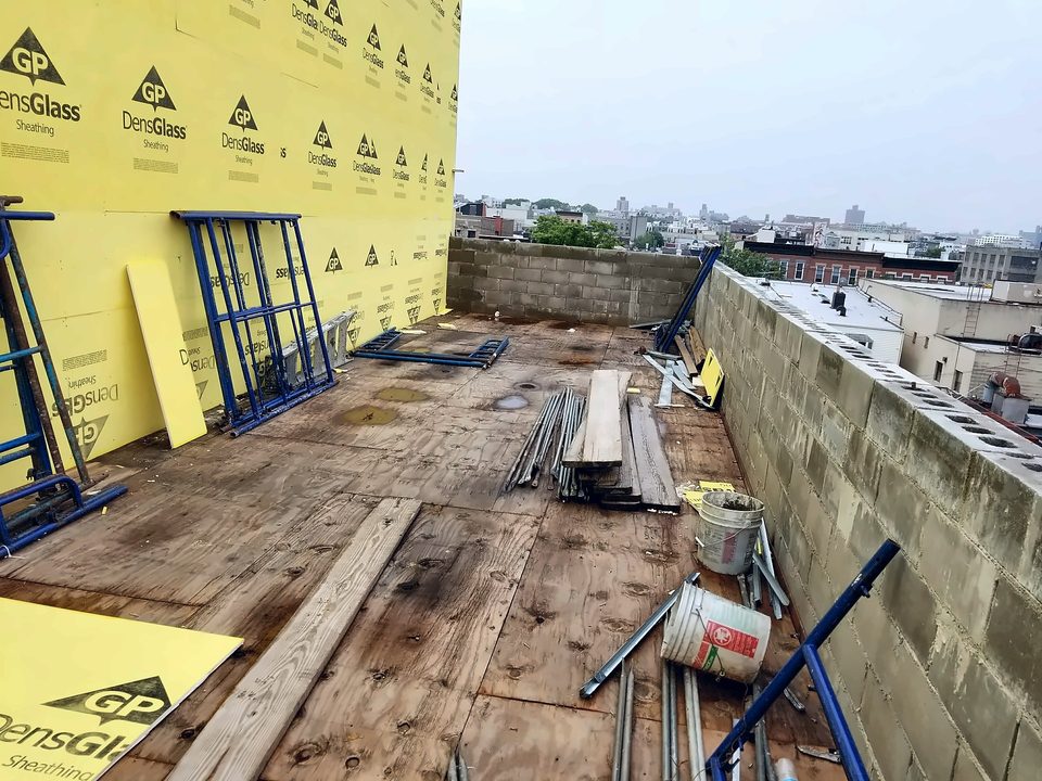 CMU block walls and sheathing at a rooftop bulkhead