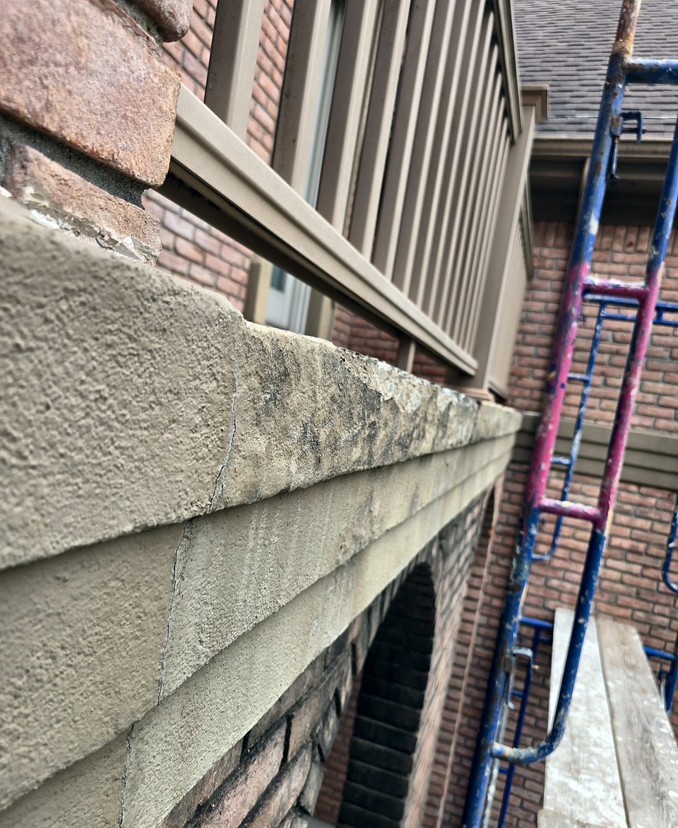 Detail: stone coping at the balcony, July 2026