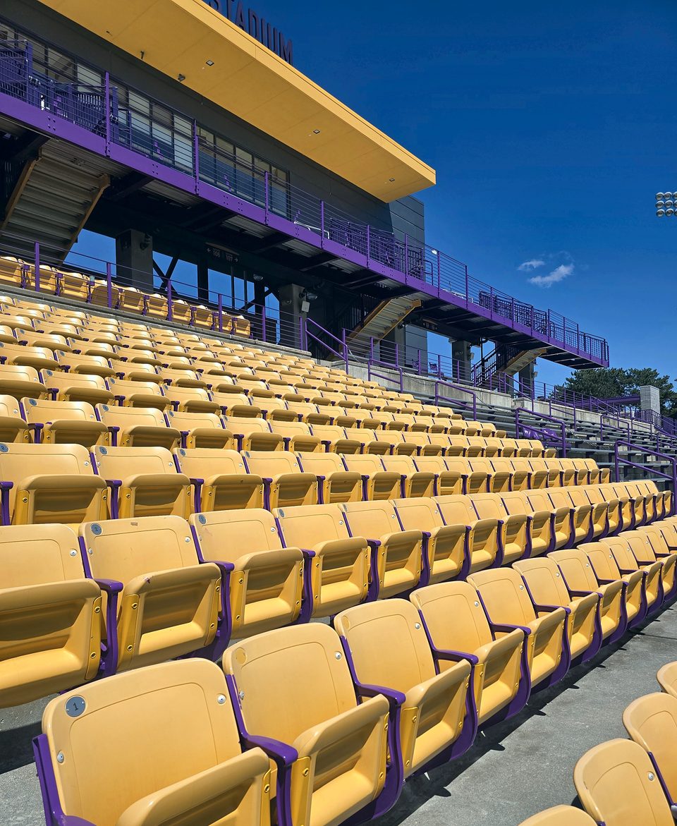 After: seat risers, brackets and canopy steel in UAlbany purple and gold, August 2026
