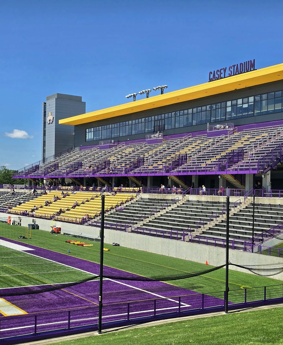 After: the repainted grandstand from the field, July 2026