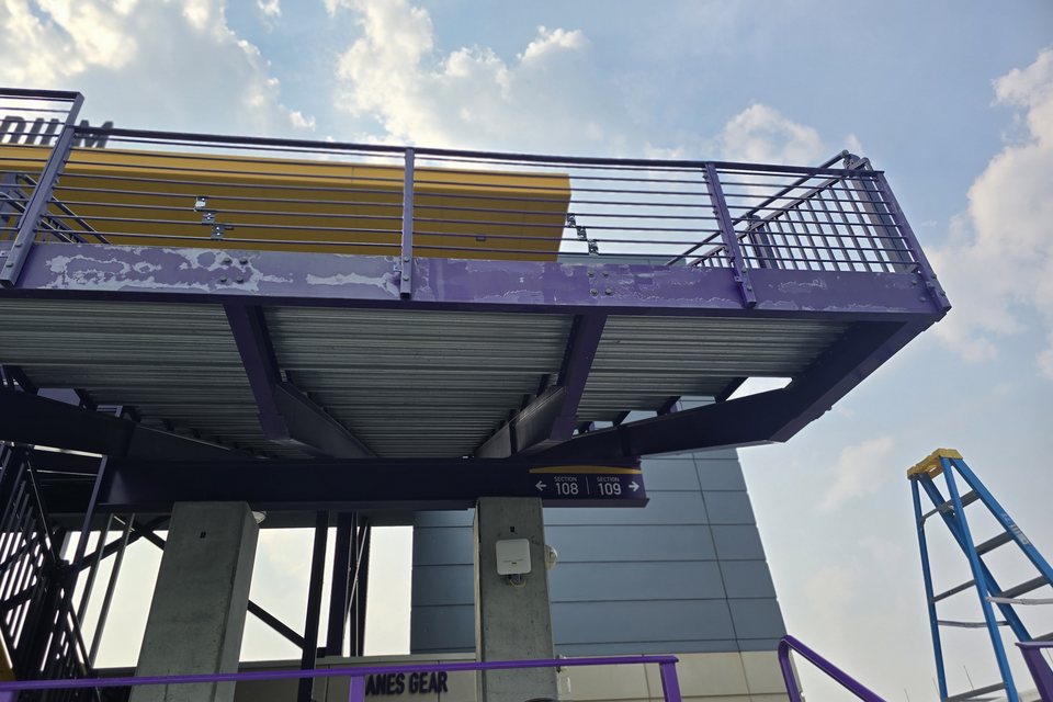 July 16, 2026 — peeling, failed coating on the press-box beam