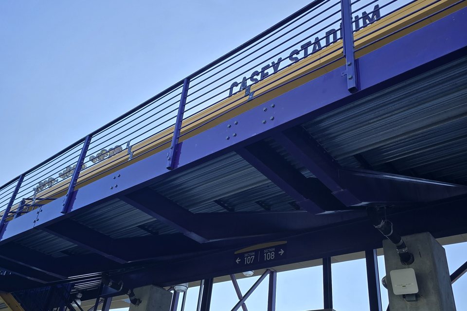 July 19, 2026 — same beam prepped, primed and repainted in UAlbany purple