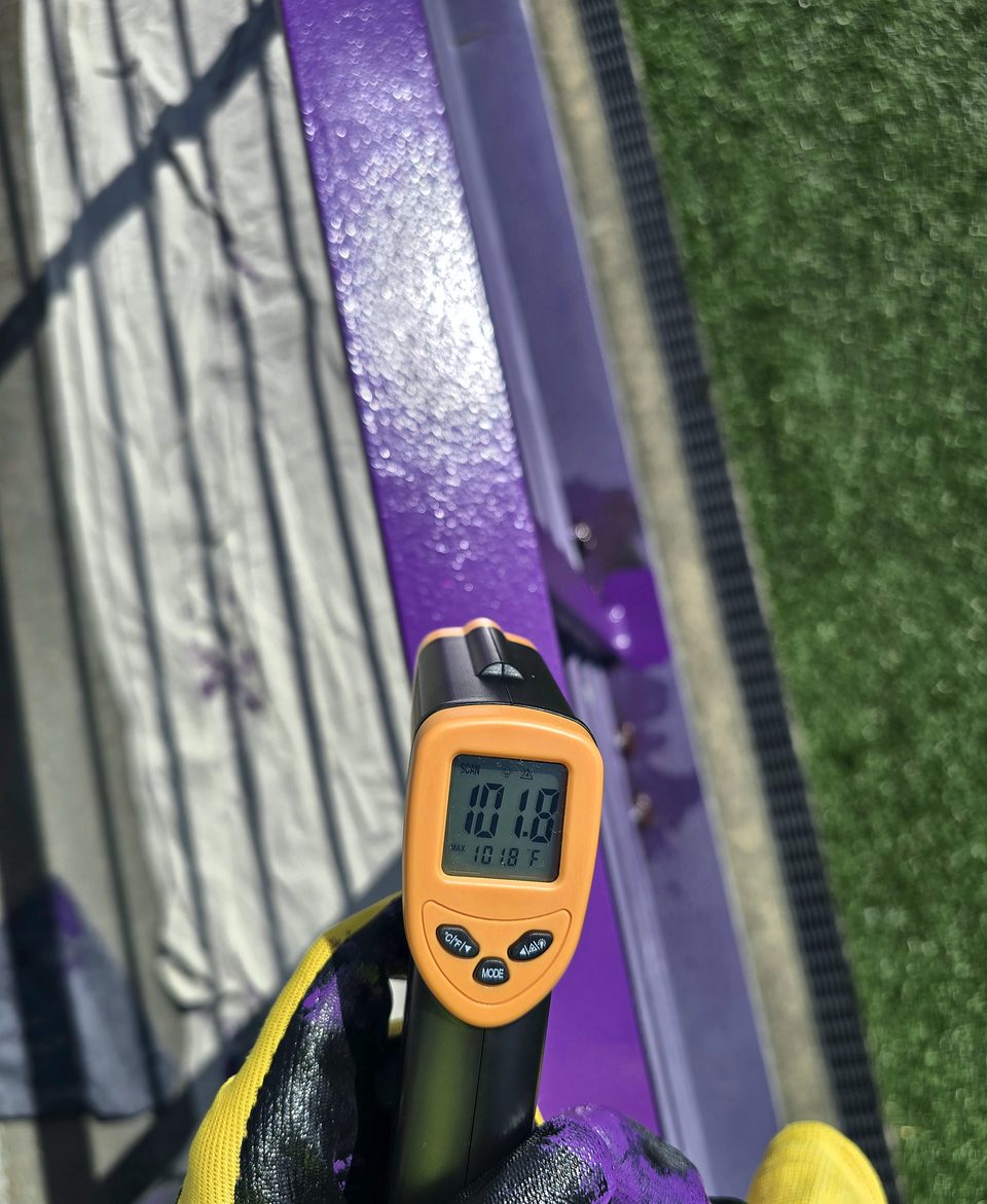 Process: steel temperature checked against the manufacturer's application window before every coat