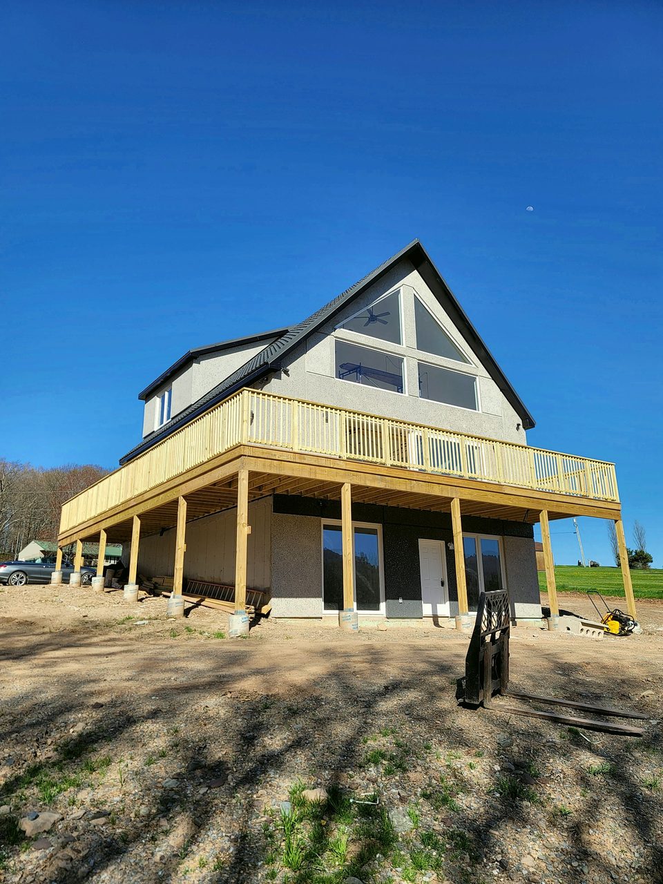 Summer 2022: the deck framed and the stucco finished