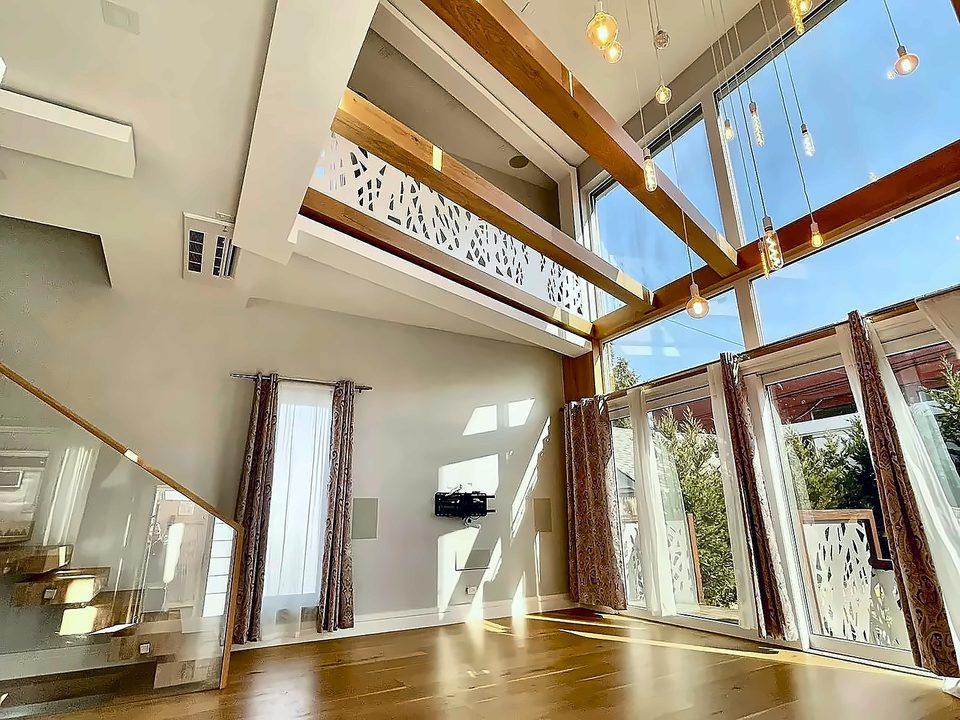 Beamed ceiling and the patterned stair guards