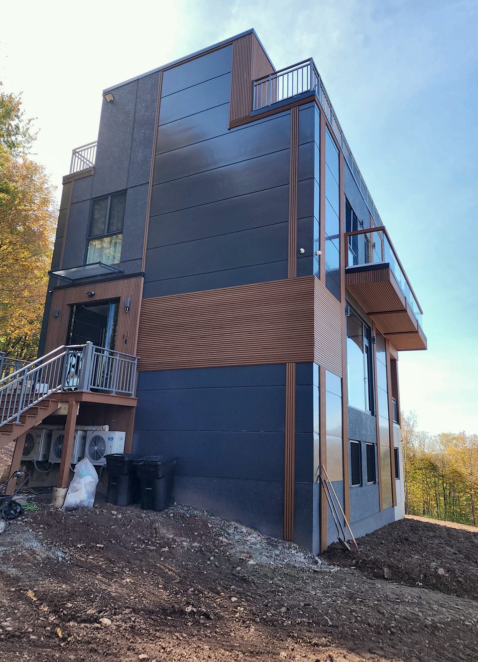 Side elevation as the cladding was completed, 2023