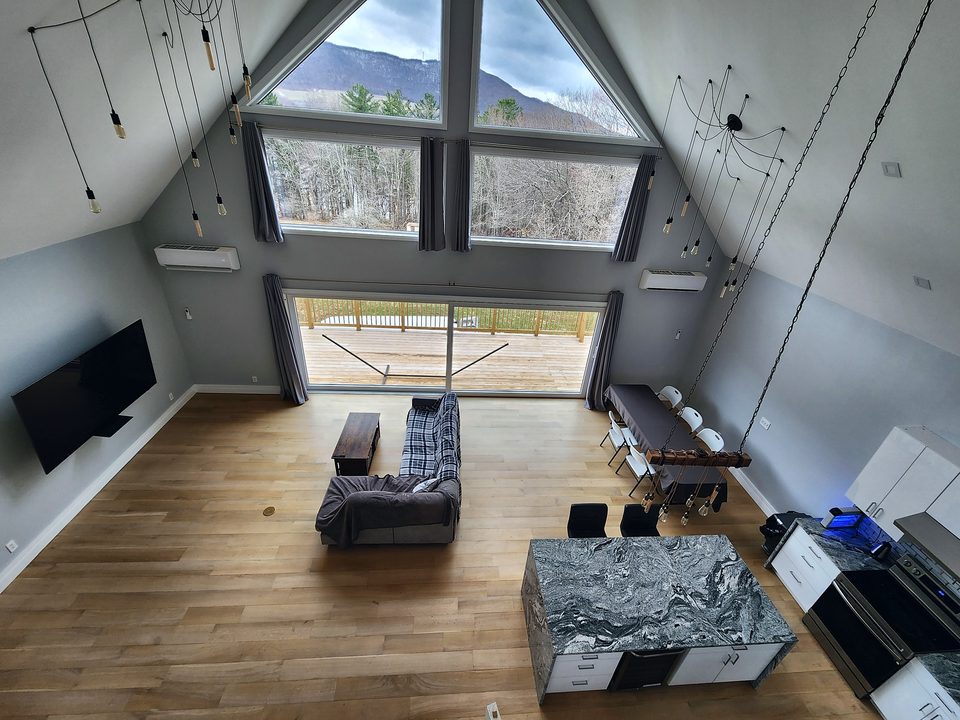 Roxbury NY — vaulted great room with mountain windows, 2023
