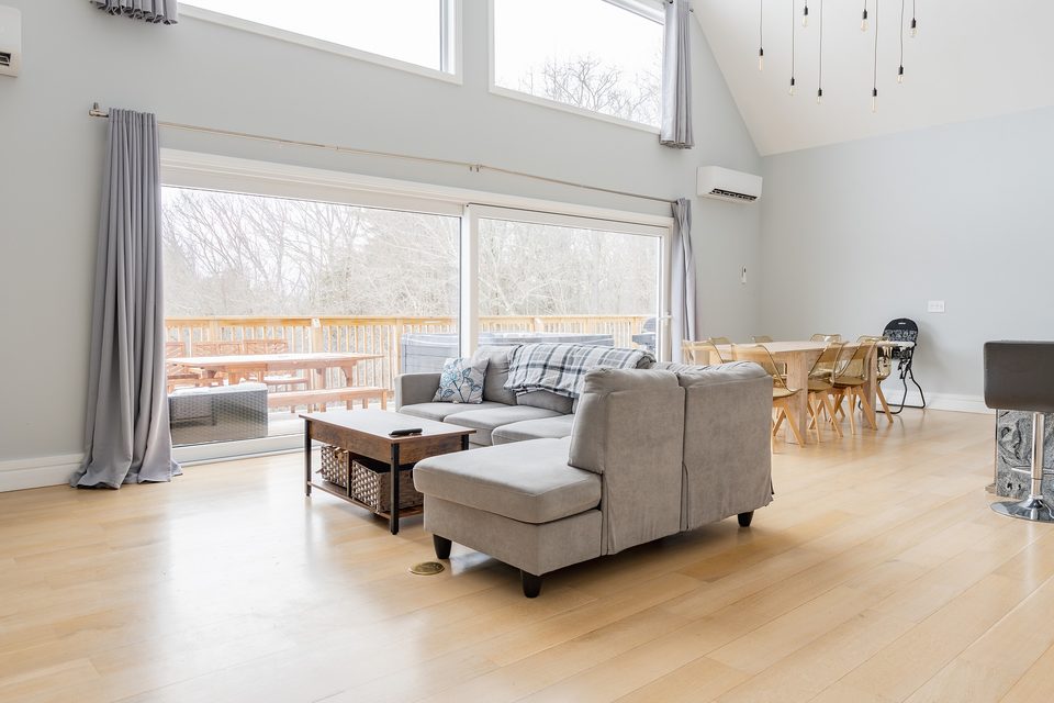 Vaulted great room with the glass gable