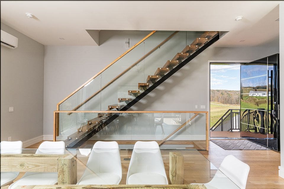 Floating oak stairs with glass guards
