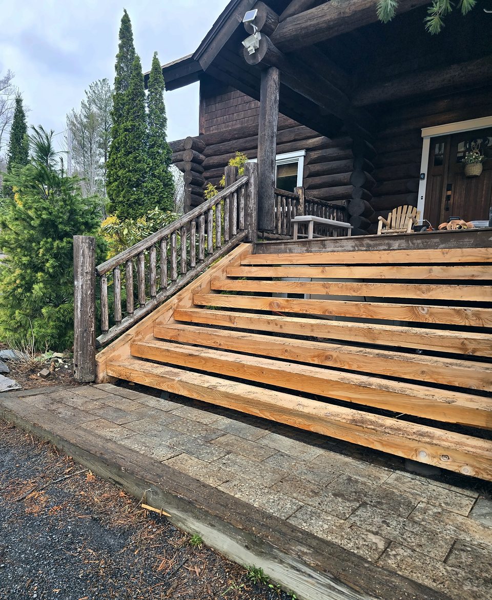 Exterior timber stair refinishing, Stamford NY — treads stripped, April 2026