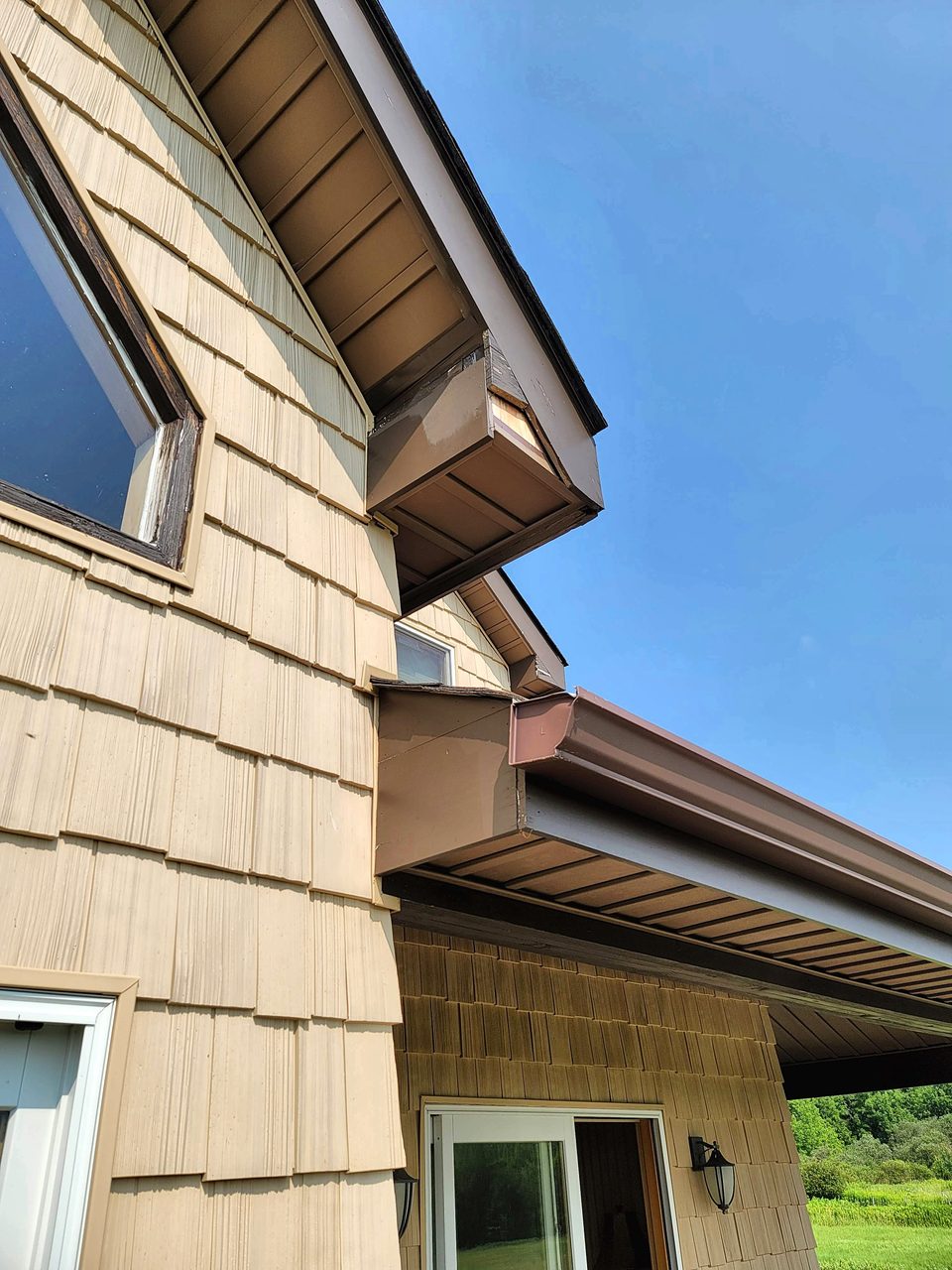 Cedar-shake dormer with standing-seam metal roof, 2021