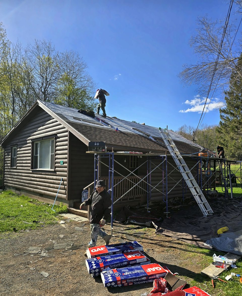 Roofing — self-performed by The Dom Construction Group