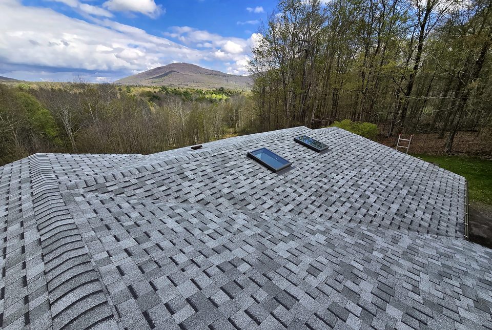 New architectural-shingle roof, 2026