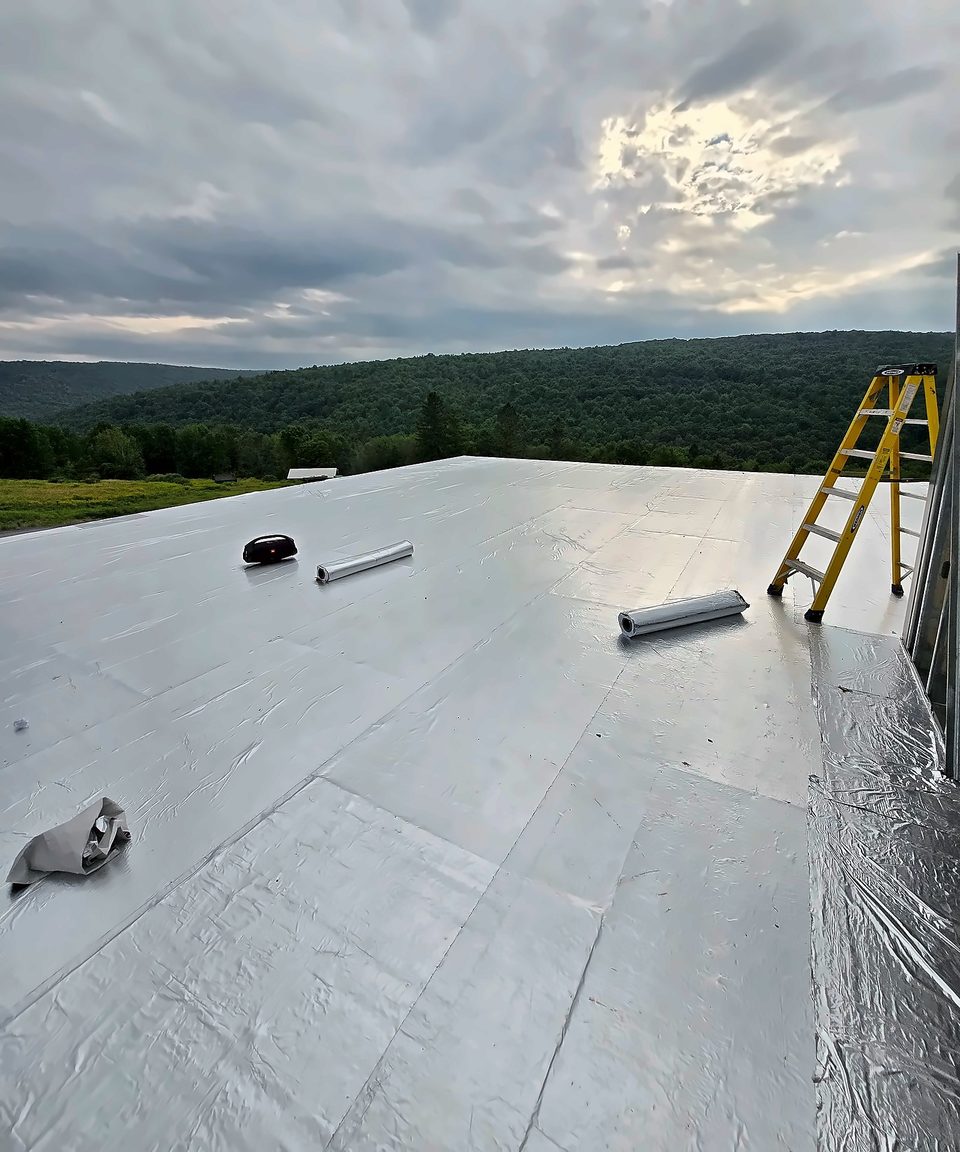 White single-ply membrane roof, 2024