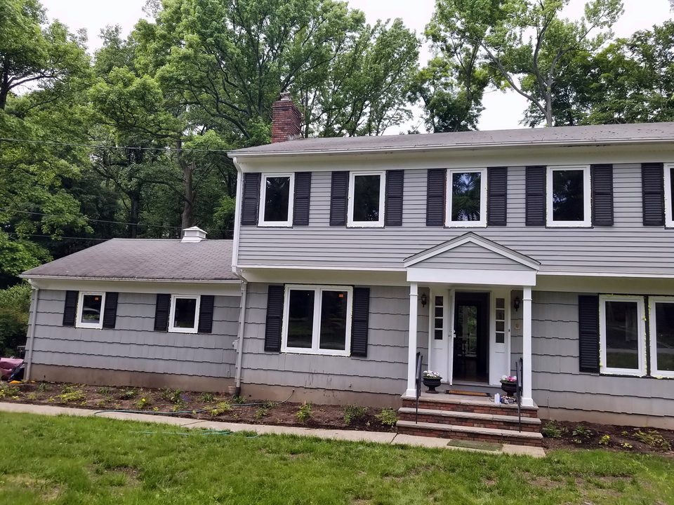 Colonial with new gray siding and trim, 2018