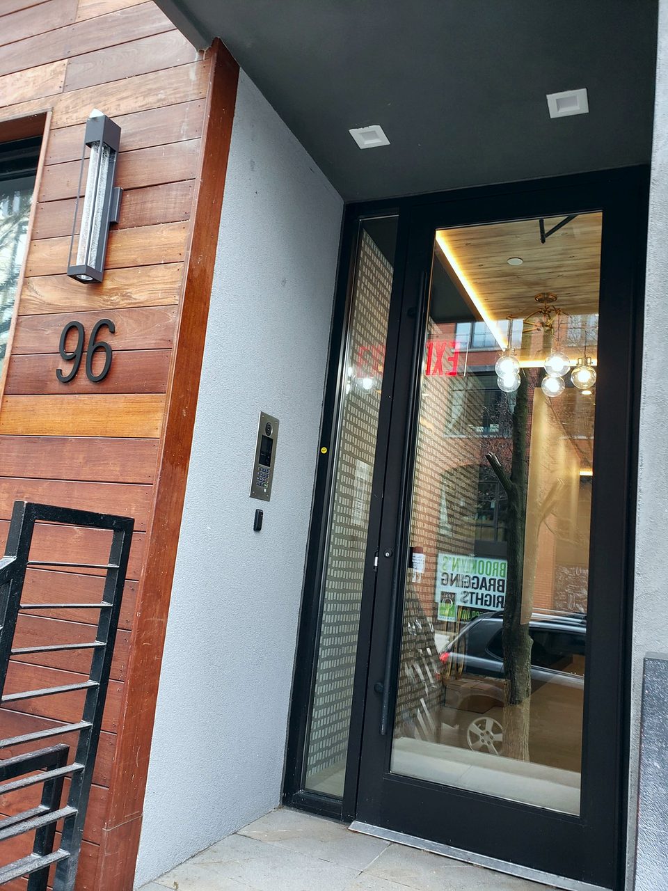 Wood-slat entry facade, 2018